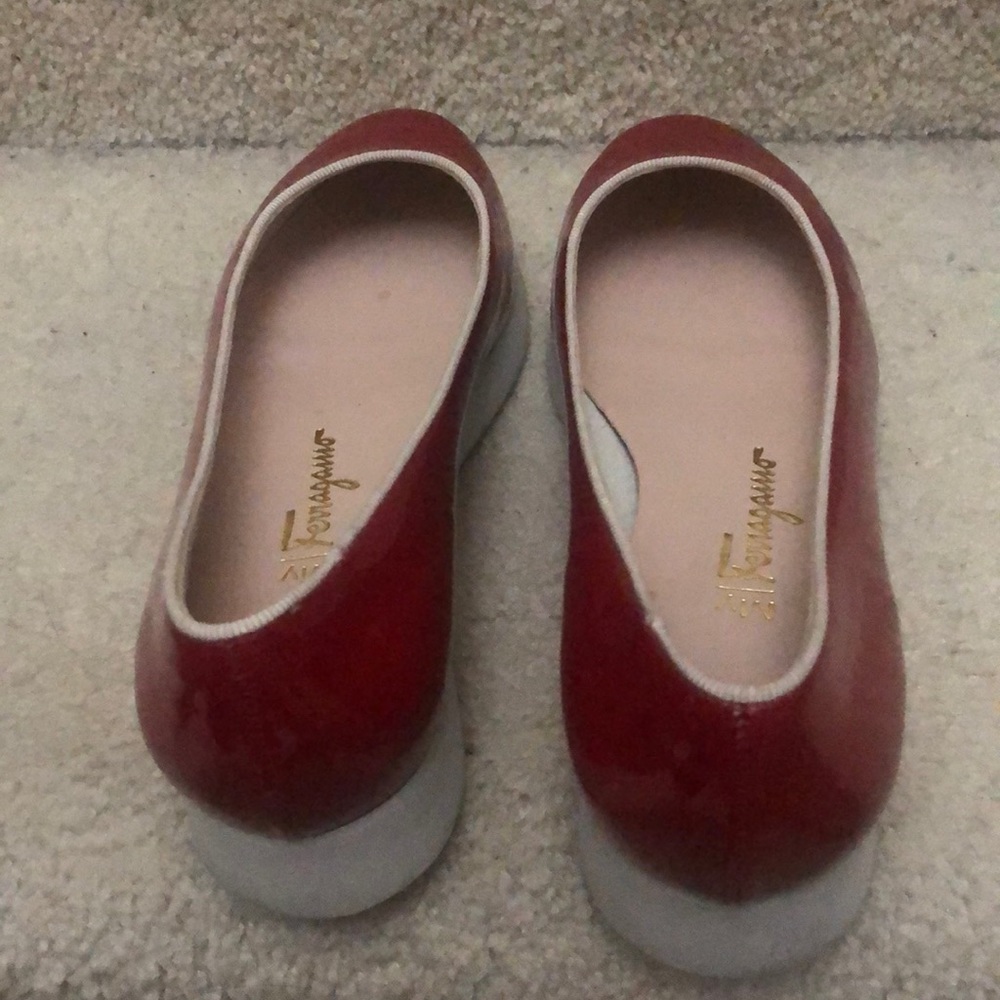 Selling a woman size 5 Salvatore Ferragamo dark red flat shoes. Original